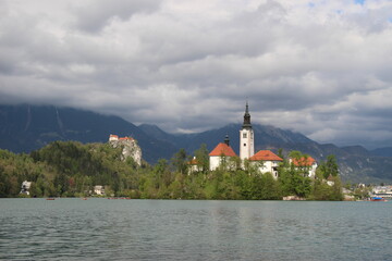Bled lake in Slovenia with an iconic church and the Bled castle
