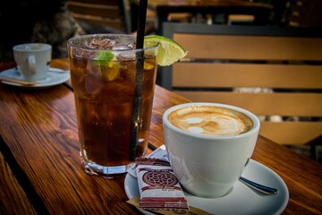 Relaxing in a restaurant - refreshing beverages - cuba libre and cafe latte