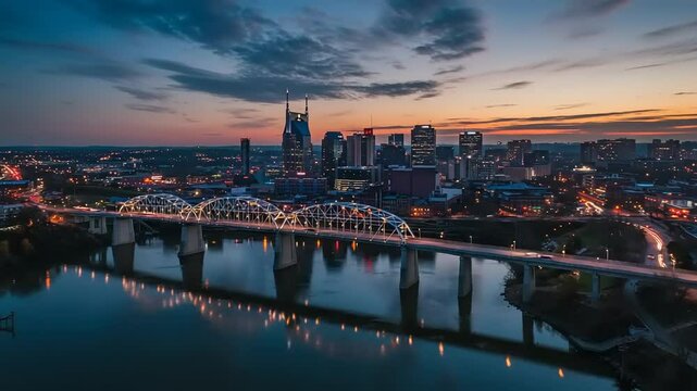 Aerial View of Downtown Nashville Tennessee Skyline Reflecting on Cumberland River at Dusk