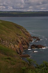 beautiful irish coastline with cliffs and stones, ardmore cliffwalk ireland