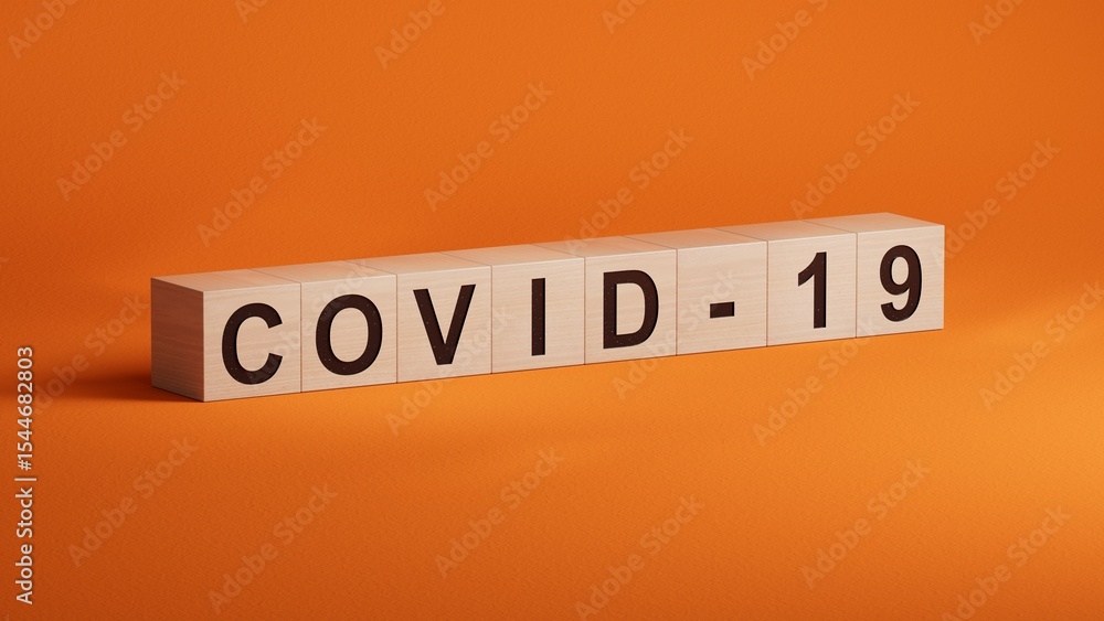 Aufkleber covid-19.wooden cubes spelling.flat lay view from above on orange background with wooden cubes butto