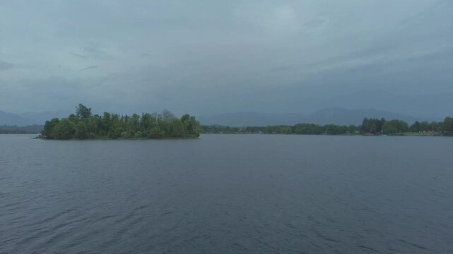 Floating over a lake with a green wild Island in the middle