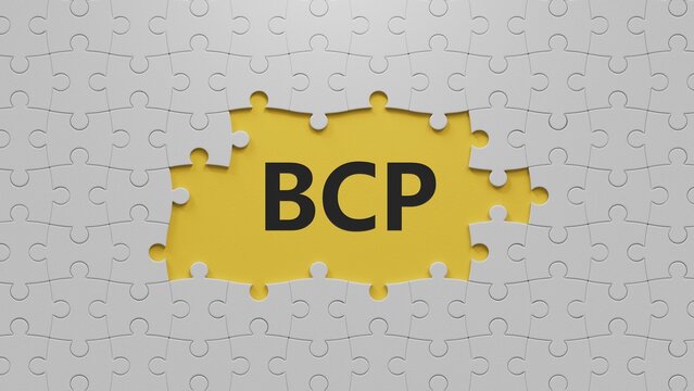 The white puzzle pieces with missing pieces with bcp text. Financial, marketing.close up of The white puzzle pieces with missing pieces,Business Concept.3D rendering on yellow background.