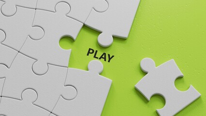 Fototapeta premium Play - word concept. Minimalist Abstract Design. close up of The white puzzle pieces with missing pieces,Business Concept. 3D rendering on green background.