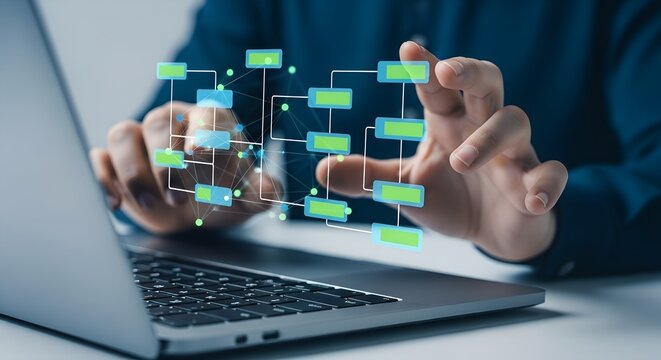 Person interacting with digital flowchart on laptop