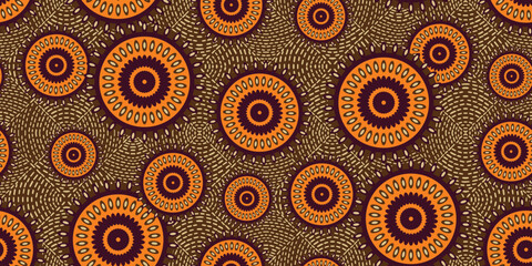 African ethnic traditional orange and brown pattern. seamless beautiful Kitenge, chitenge style. fashion design in colorful. Geometric circle abstract motif. Floral Ankara prints, African wax prints.