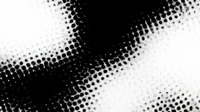 Halftone dynamic abstract pattern of black and white dots forming a graphic monochrome texture, ideal for creative backgrounds and artistic overlays.