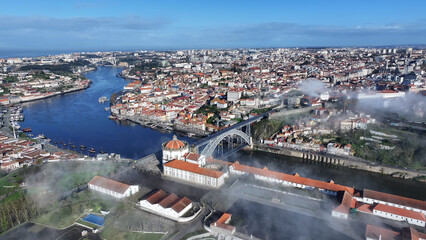 Fototapeta premium Porto Skyline At Porto In District Of Porto Portugal. Coastal City. Fog Morning Landscape. Medieval Buildings Scenery. Porto Skyline In Portugal. Portugal Skyline. Travel Landscape.