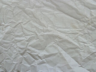 the texture of crumpled gray paper in close-up.