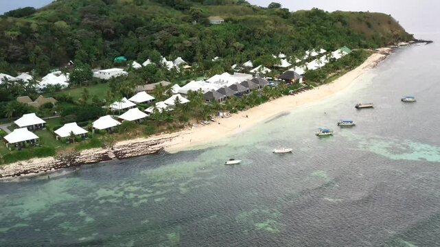 Shallow coral reefs beach at Tokoriki island in Fiji &ndash; tropical tourism resort destination.
