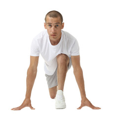 Runner in starting position on white background