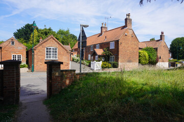 Nottingham, Nottinghamshire, England – June 18 2025: A quaint village scene in the UK with...