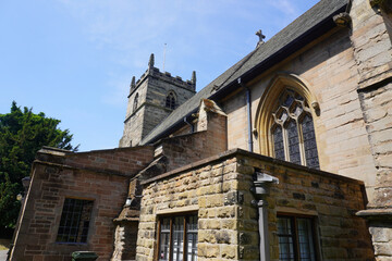 Nottingham, Nottinghamshire, England – June 18 2025: Historic stone church with traditional...