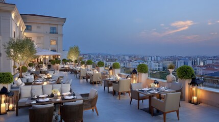 Rooftop with dining tables arranged under hanging lamps, city backdrop at dusk