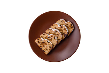 Christmas Stollen, a German sweet cake with marzipan and fruit. Winter Christmas Stollen