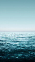 Fototapeta premium 水平線と穏やかな海の縦型背景 