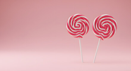 Two Pink Swirled Lollipops on Soft Pink Background