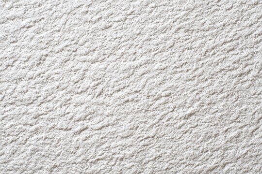 Close-up view of a textured, light-gray surface - Powered by Adobe