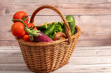 vegetables in a basket,Basket full of vitamins – a colorful assortment of fresh vegetables, Healthy eating, organic lifestyle, and natural food concept.