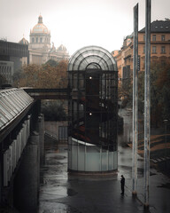 in front of prague main station on a rainy day