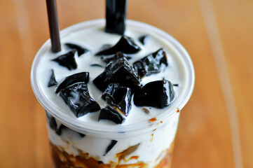 milk and jelly, jelly milk tea with sugar topping or milk with jelly topping or glass jelly