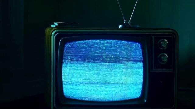 Vintage television tube showcasing animated static and neon glitch effects with flickering screens - Powered by Adobe