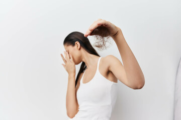 Naklejka premium Woman terrified of hair loss, hair loss and hair quality issues 
