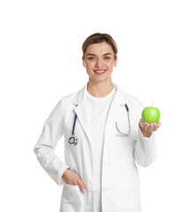 Nutritionist with green apple and stethoscope on white background