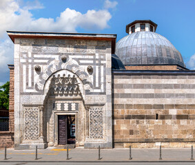 Located in Konya, Turkey, Karatay Madrasa features exquisite stonework and a domed roof. This historical site highlights the beauty of Islamic architecture and serves as a cultural landmark