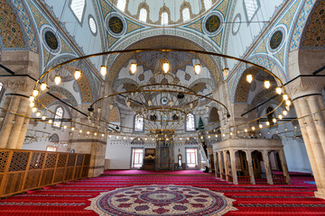 Intricate patterns and vibrant colors fill the interior of Selimiye Camii, a beautiful iconic mosque in Konya, Turkey, with its grand arches and ornate details