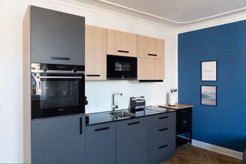 Modern luxury kitchen interior in minimal scandinavian style, blue color