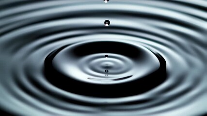 Water drop falling on marble in slow motion - Powered by Adobe