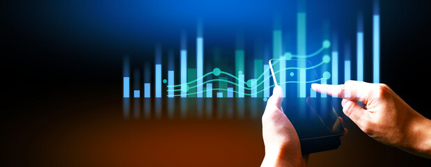 hand of businessman interactive touching a holographic of transaction financial network data...