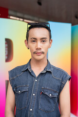 Portrait of confident non binary gay man during pride outdoors