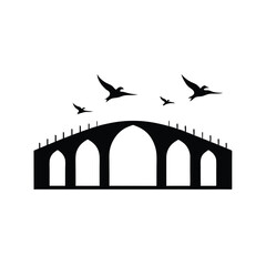 Ancient stone arch bridge silhouette over a river, a historic architectural landmark in a beautiful landscape under the sky