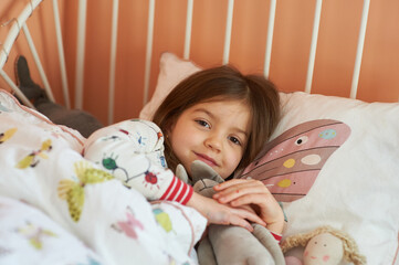 portrait of a cute girl at cozy home