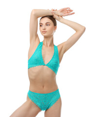 Woman wearing beautiful underwear on white background