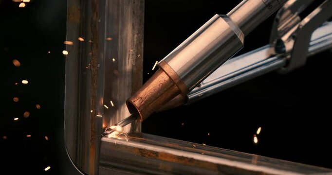 Laser welding machine. Shot on super slow motion camera 1000 fps. Laser welding is shown in close-up