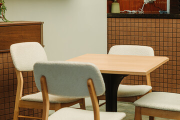 Modern Wooden Chairs and Table in Indoor Café