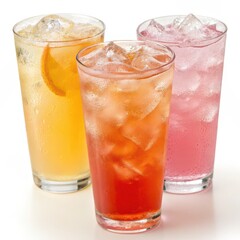 Three tall glasses filled with vibrant iced fruit beverages orange, red, and pink served cold with ice cubes on white background.