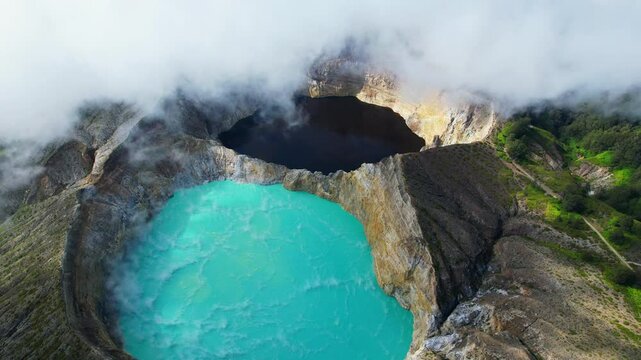 Aerial shot of the three colour lakes of Kelimutu volcano national park in Flores island, Indonesia