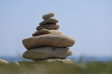 stack of stones on the beach relax holiday meditation