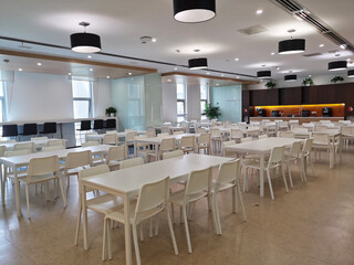 Inside the Corporate Dining Area,White Tables, Coffee and Water Facilities