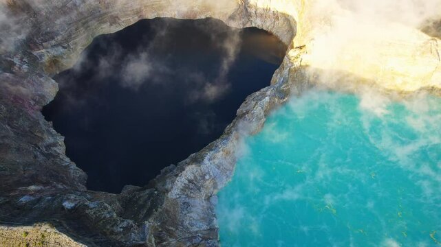 Aerial shot of the three colour lakes of Kelimutu volcano national park in Flores island, Indonesia