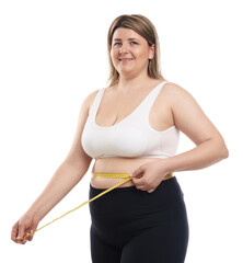 Weight loss. Plus size woman measuring waist with tape on white background