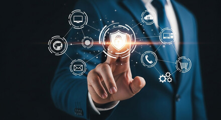 Man in suit touching a digital shield surrounded by icons representing online services and security features