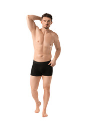 Fototapeta premium Young man in stylish black underwear on white background
