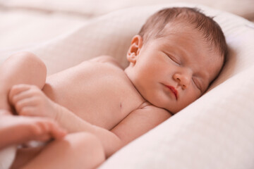 Bedtime. Cute little baby sleeping in lounger indoors