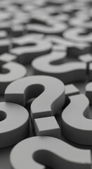 Fototapeta premium Close-up of numerous gray question marks, creating a textured background suggesting uncertainty or inquiry