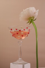 Cocktail for St Valentines with white flower beside